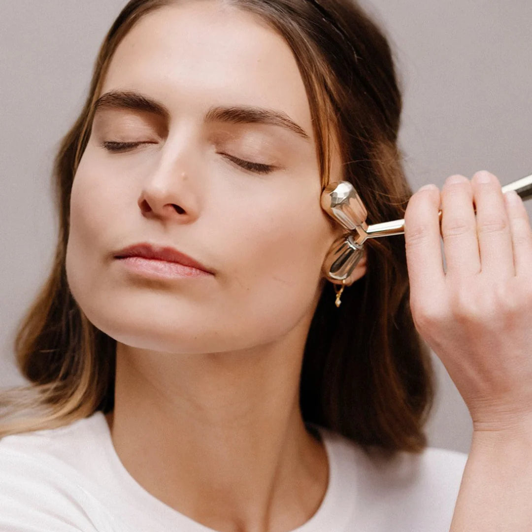 Roller massant et drainant pour le visage